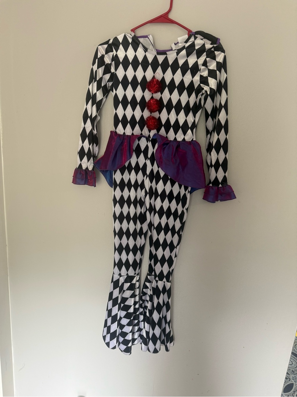 Spirit Black & White Harlequin Jumpsuit with Purple Peplum